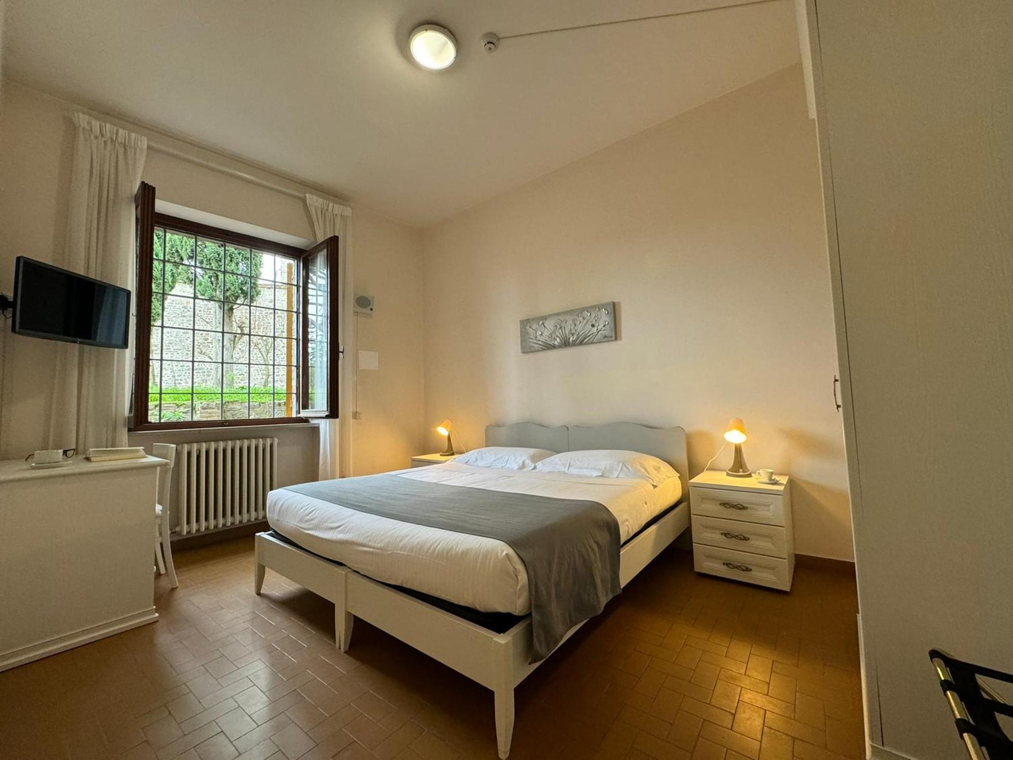 Monastero Ss. Annunziata Hotel Todi Eksteriør billede A room at the hotel
